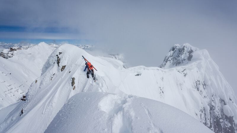  A mountain biker leans into a turn on the descent. 